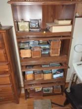 (BR3) PRESS BOARD DARK WOODGRAIN BARRISTER BOOKCASE. HAS 4 SHELVES WITH GLASS FRONT DOORS. MEASURES