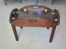 (LR) THE BOMBAY COMPANY OVAL BUTLERS TABLE WITH FOLDING SIDES. THE TOP REMOVES FROM THE BASE. MARKED