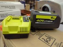 BATTERY AND CHARGER IS COMPATIBLE WITH RYOBI LAWN MOWER 40V.