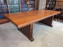 (OFC2) LARGE WALNUT CONFERENCE ROOM TABLE. A LARGE WALNUT TOP SITS ON TWO REEDED DETAILED SQUARE