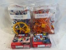 Two NASCAR Lego sets, and two bags of Lego Kinect sets