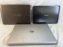 Lot of three laptops. One Sony Vaio, one Dell, one Asus.