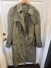 Army issued Gray button up trench coat with belt. Size 42XL. Insulated.