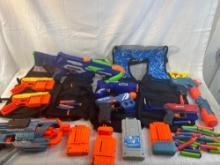 Nerf/air gun lot with tactical vests, extra darts and clips