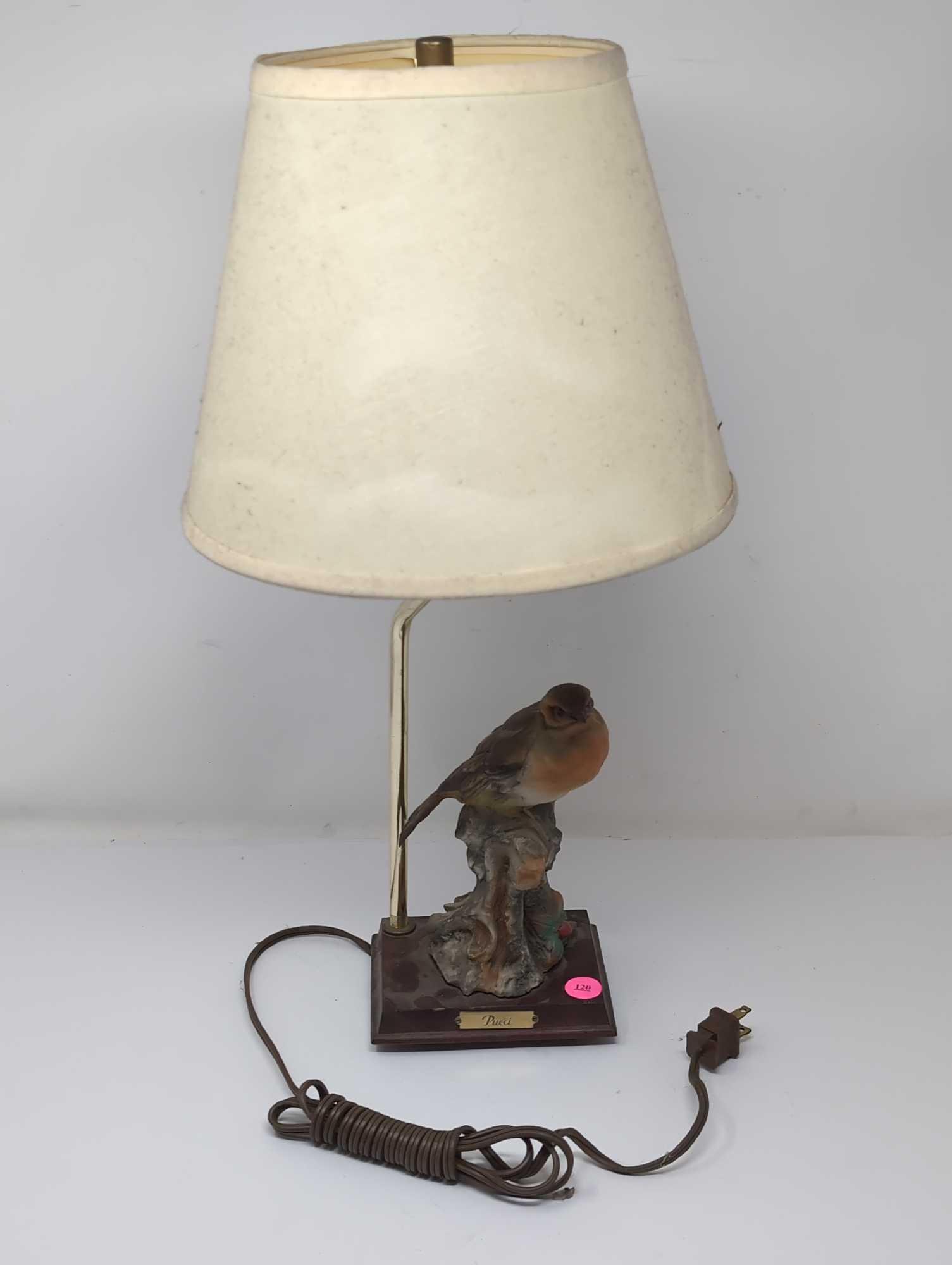 (FOYER) CERAMIC PUCCI BIRD TABLE LAMP WITH WOOD BASE, BRASS ARM, BRASS HARP, FINIAL, & PAPER SHADE.