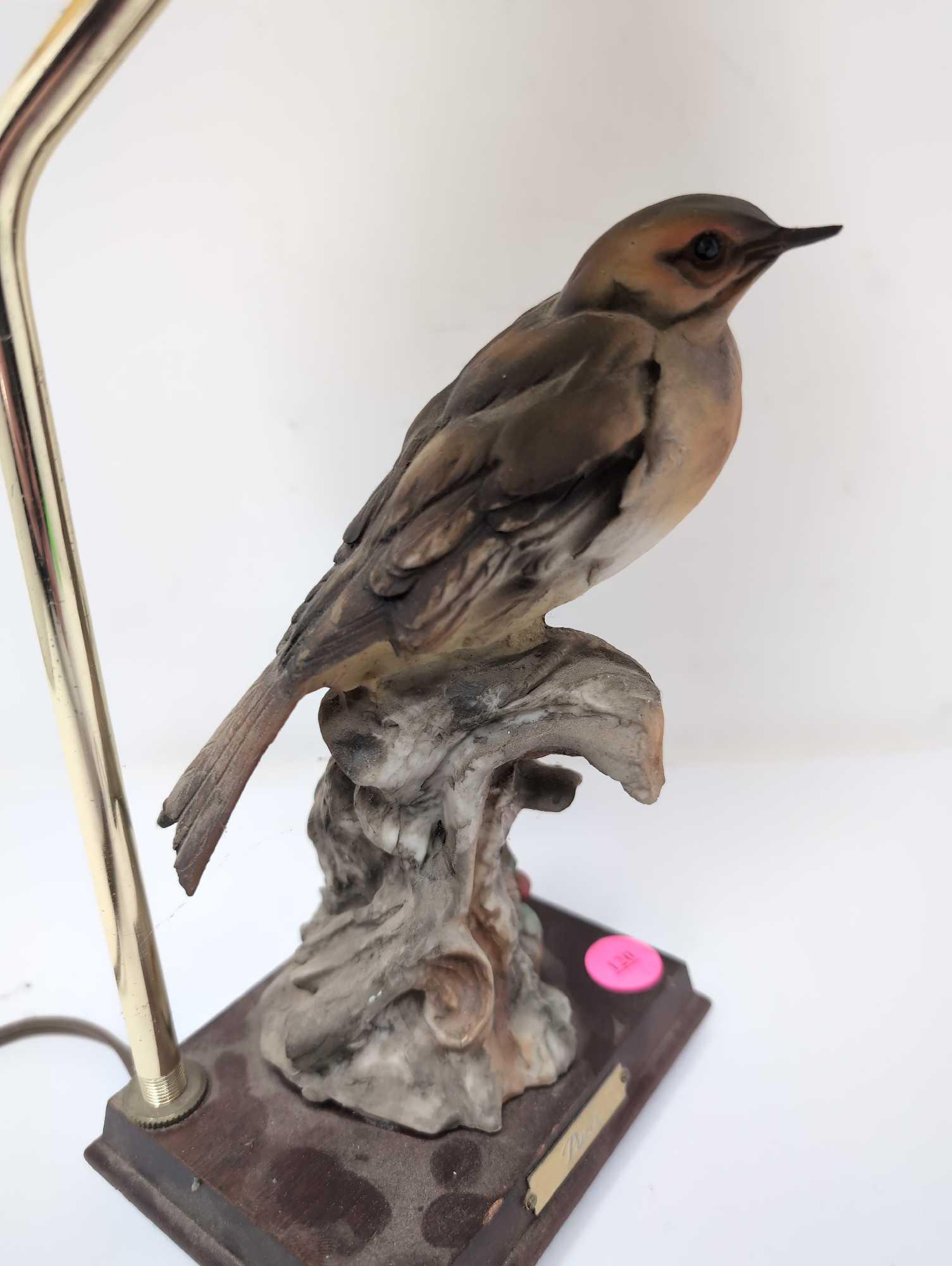 (FOYER) CERAMIC PUCCI BIRD TABLE LAMP WITH WOOD BASE, BRASS ARM, BRASS HARP, FINIAL, & PAPER SHADE.