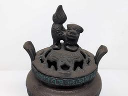 (FOYER) ANTIQUE TIBETAN BRONZE TONED INCENSE BURNER FEATURING A FOO DOG DETAILED LID, GREEK KEY