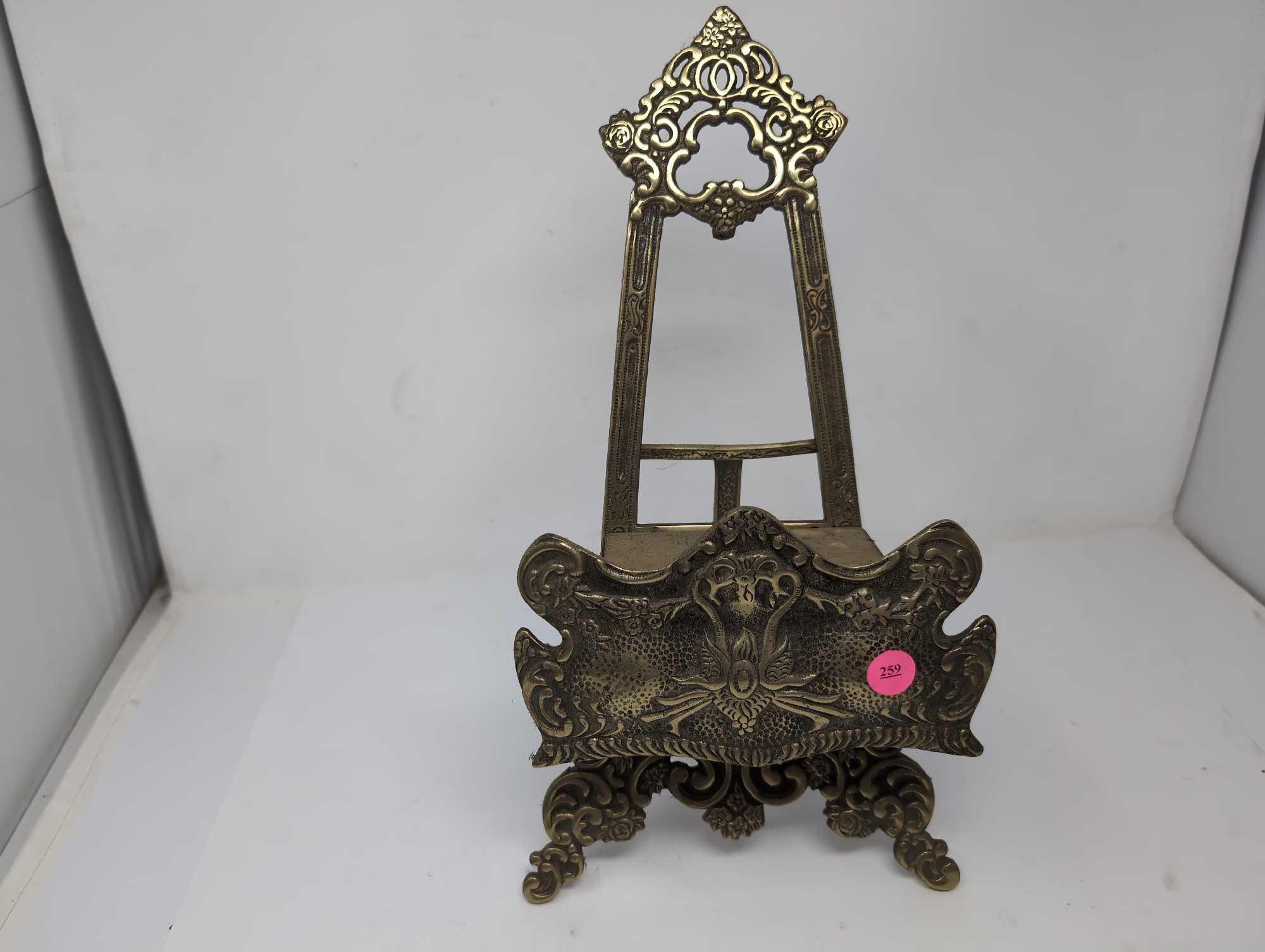 (LR) VINTAGE ORNATE BRASS TABLE TOP EASEL BOOK/PLATE STAND, STAMPED JAPAN. IT MEASURES APPROX. 8"W X