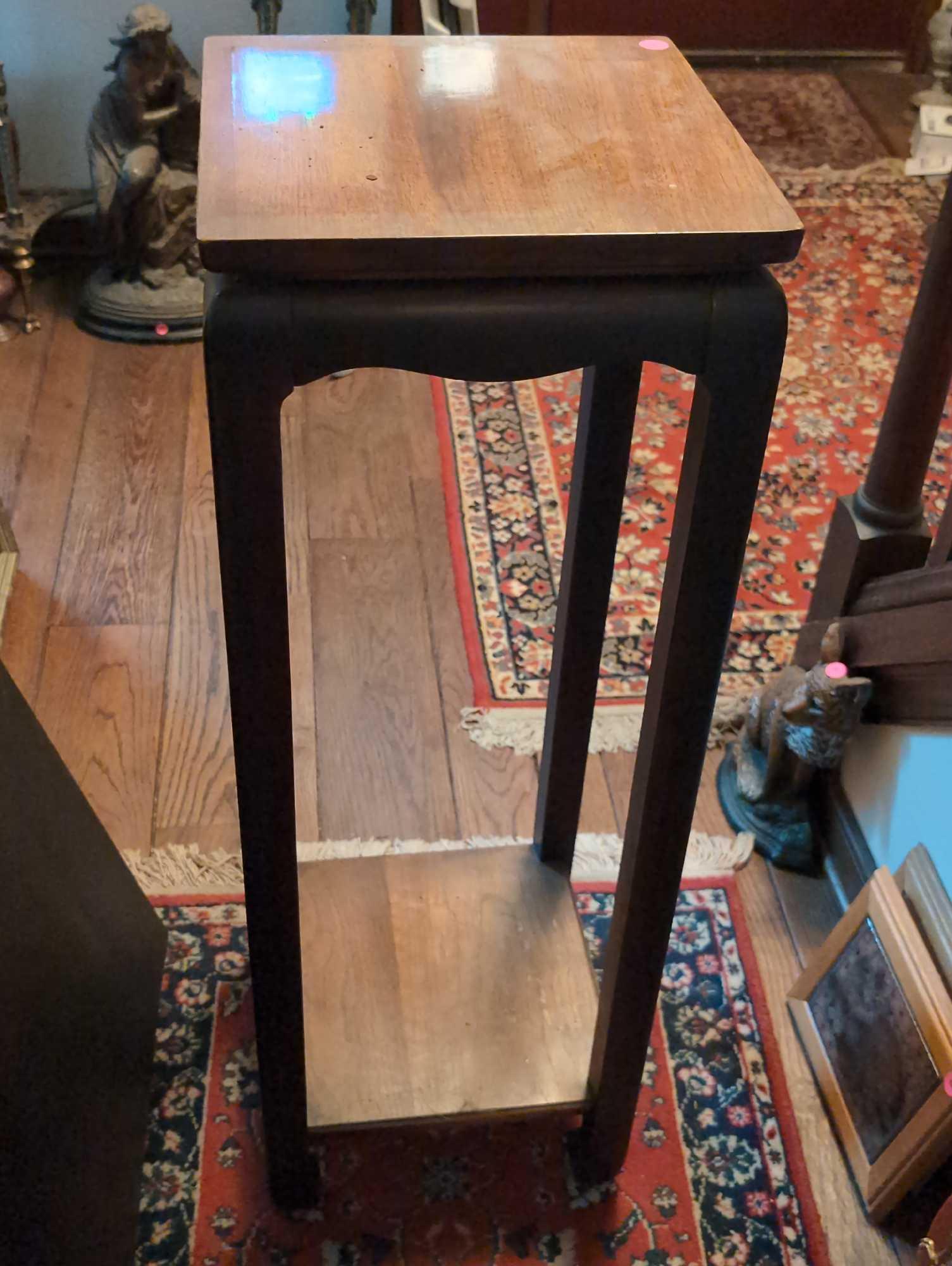 (LR) LANE MAHOGANY MID CENTURY MODERN PLANT STAND. MARKED ON THE BOTTOM. IT MEASURES APPROX. 12"W X