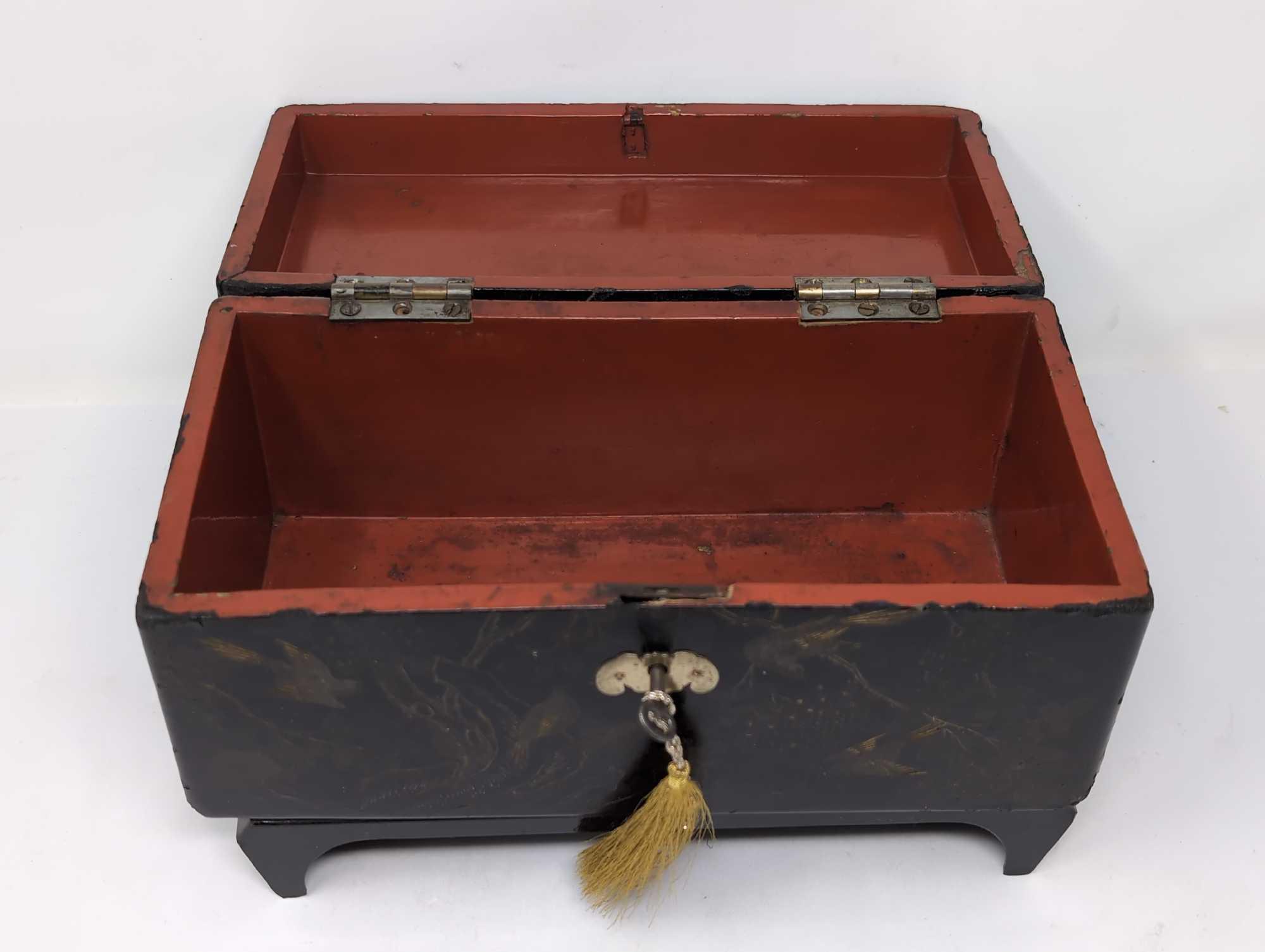 (FOYER) ANTIQUE JAPANESE BLACK LACQUERED STORAGE BOX WITH GOLD BIRD/TREE DETAILS & RED PAINTED