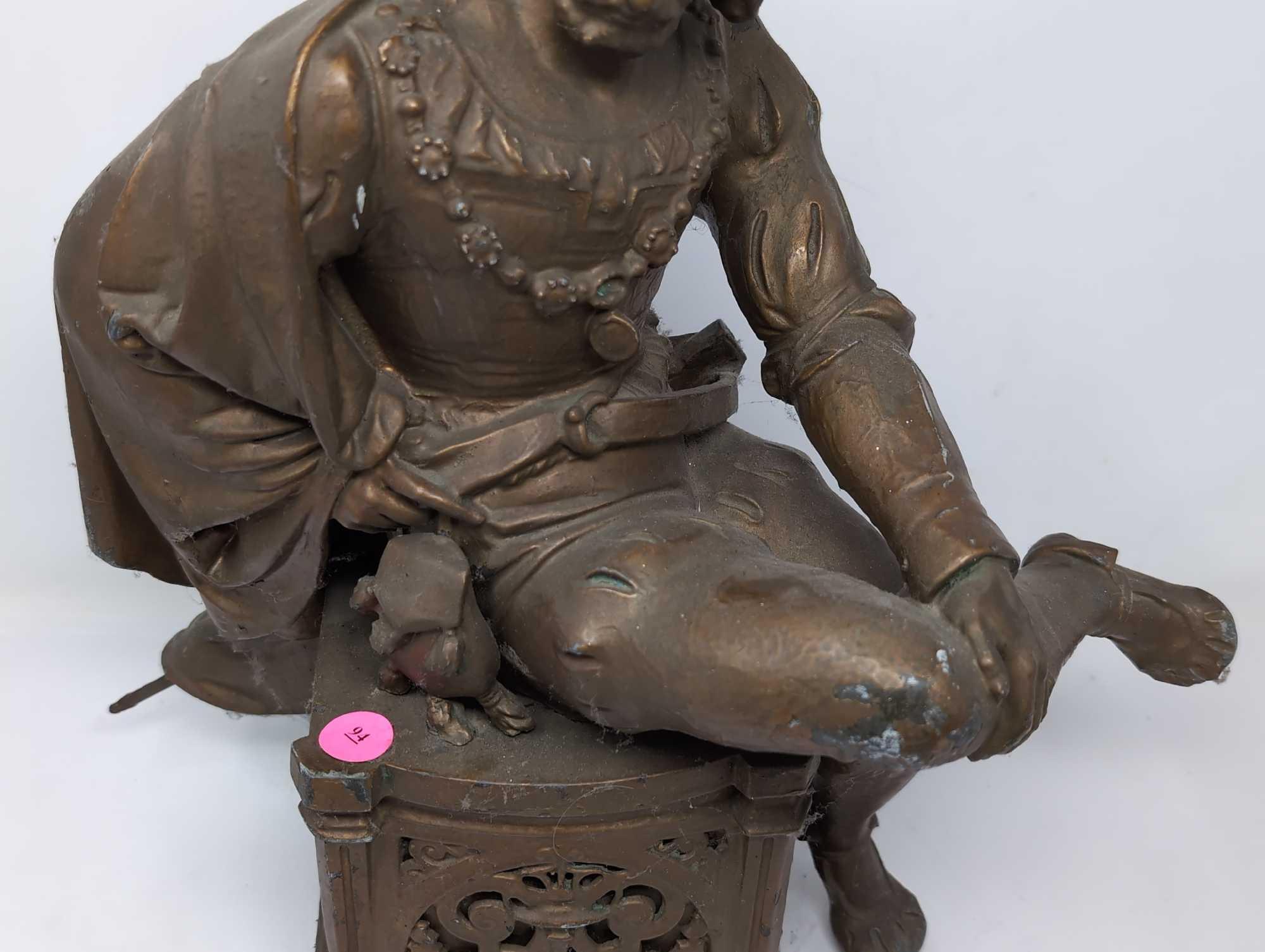 (FOYER) ANTIQUE VICTORIAN SPELTER STATUE DEPICTING AN ENGLISHMAN SITTING ON AN ORNATE BAT DETAILED