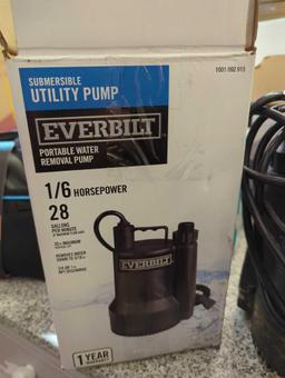Everbilt 1/6 HP Plastic Submersible Utility Pump, OPEN BOX, UNIT APPEARS HEAVILY USED, MSRP 109.00