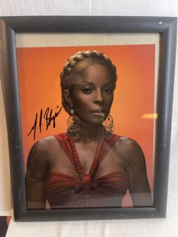 Autographed photo of Mary J. Blige with certificate of authenticity. 8x10.