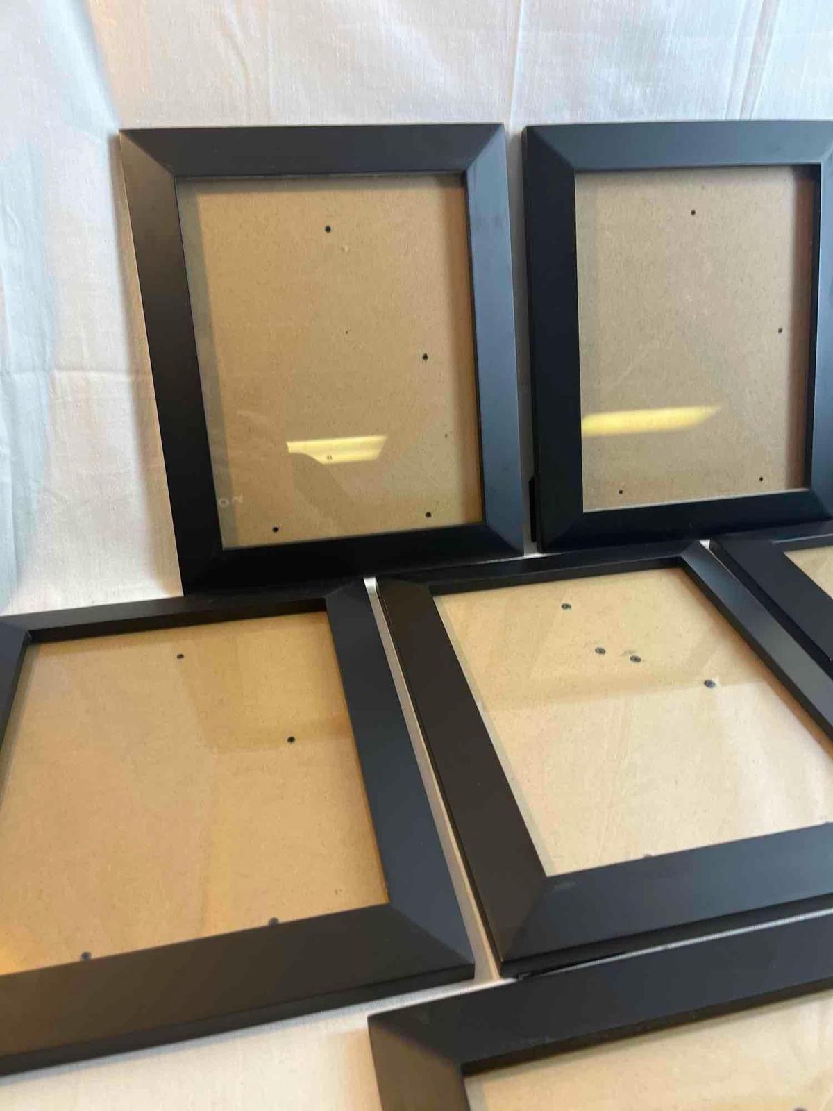 Lot of 5 black frames. 10" x 12"