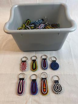 Large lot of hand made beaded keychains