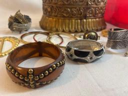 Costume jewelry lot with heavy resin jewelry box....