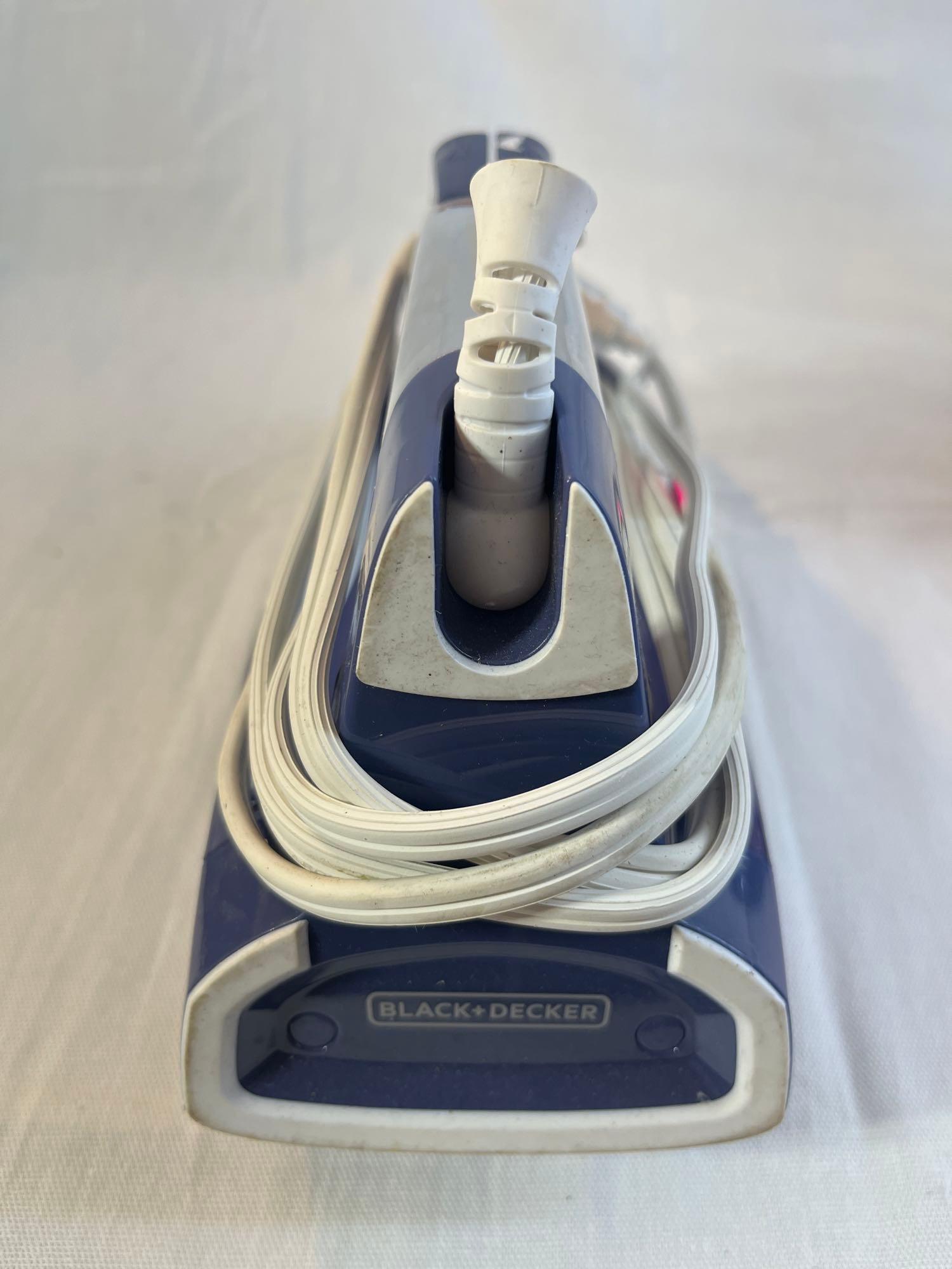 Two steam irons. Black & Decker EvenSteam and Rowenta Pro Steam