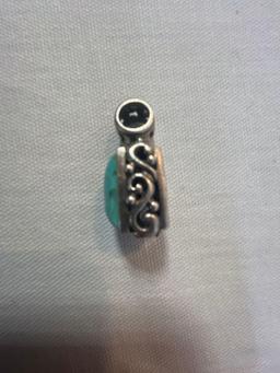 Sterling silver Kingman turquoise pendant. Marked 925