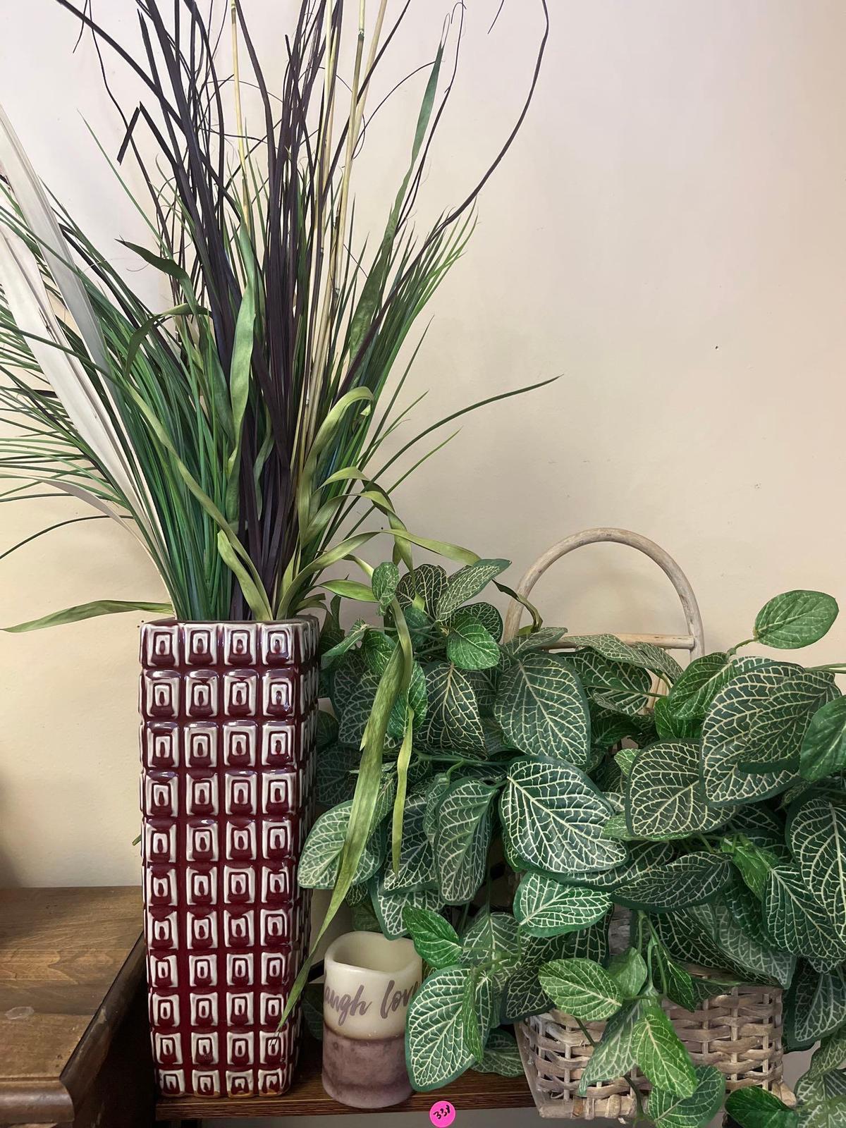 Assorted planters with decorative candle