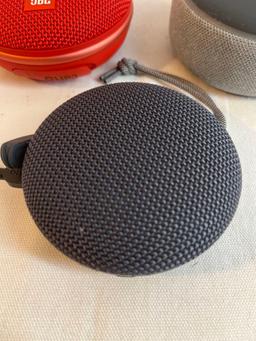 JBL Bluetooth speaker, Onn Bluetooth speaker, Amazon Echo Dot.