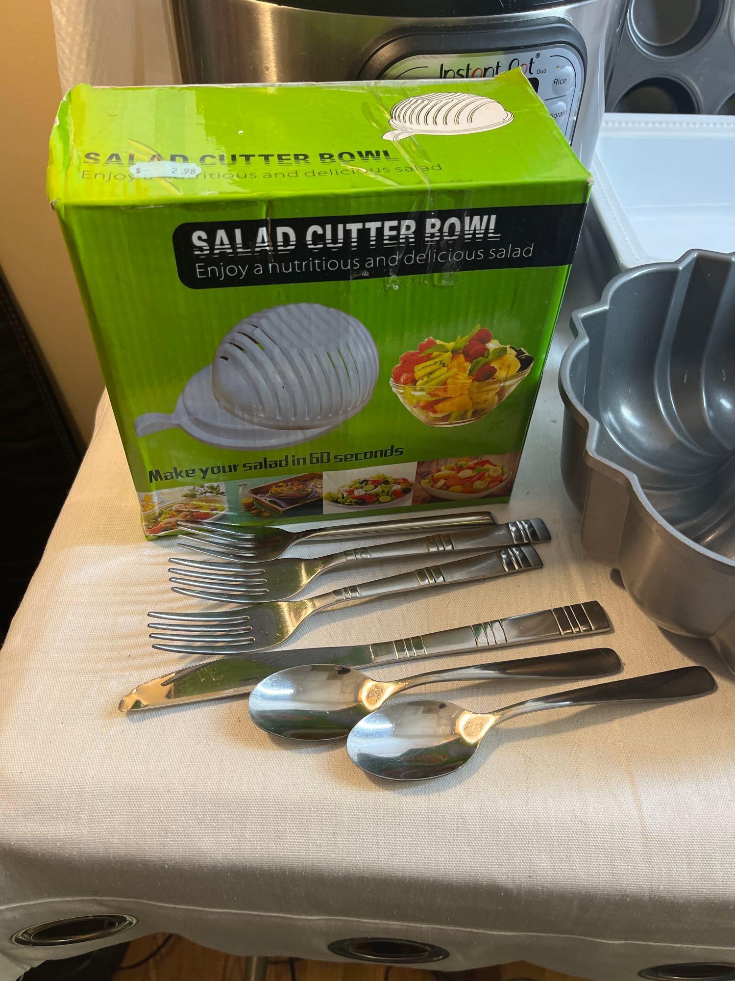 Huge kitchen lot: Instant Pot, muffin tin, salad cutter bowl, utensils, pizza cutter, glass baking