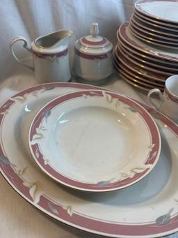 Large lot of dinnerware including plates, bowls, mugs, sugar bowl, creamer....Royal Majestic Fine