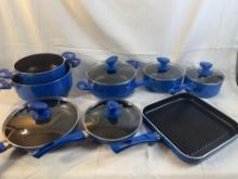 Blue nonstick cookware set. Pots, pans, grill pan, lids.