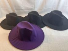 Lot of four wide brimmed hats. One purple with yellow inside, three black with red inside....