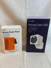 Lot of two Wyze cameras: Wyze Pan, Wyze...Cam OG in boxes. Color night vision, 2-way audio, 24/7