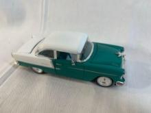 Model Car, 1955 Chevrolet Bel Air. Green teal and white. Original packaging. Certificate of