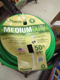 Box lot of Assorted Items to Include, Flexon Medium Duty 50 Ft Garden Hose, Melnor Yard Sprinkler,