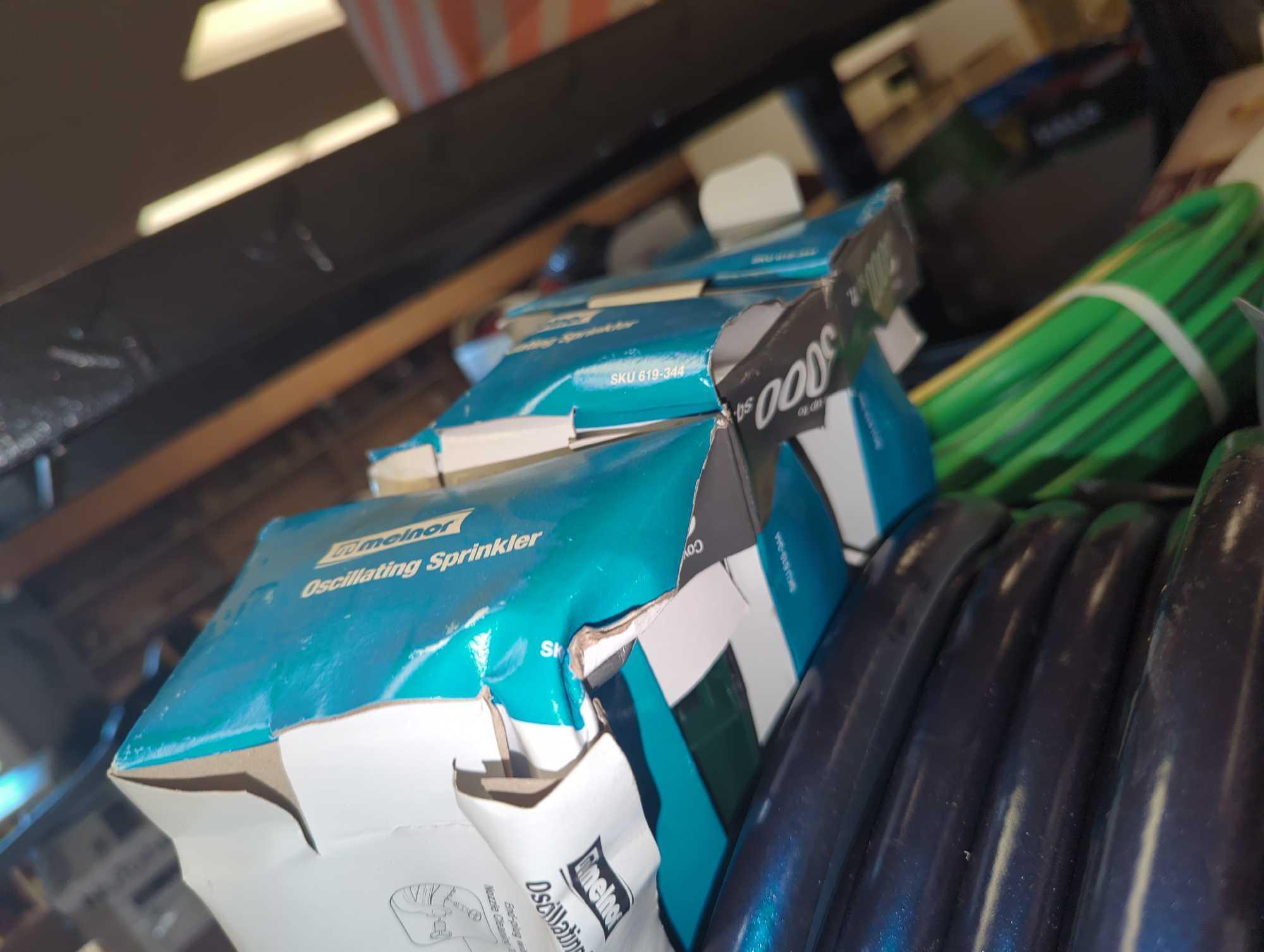 Partial Shelf Lot of Assorted Items Including Swan 100 Foot Professional Duty Hose, Glacier Bay