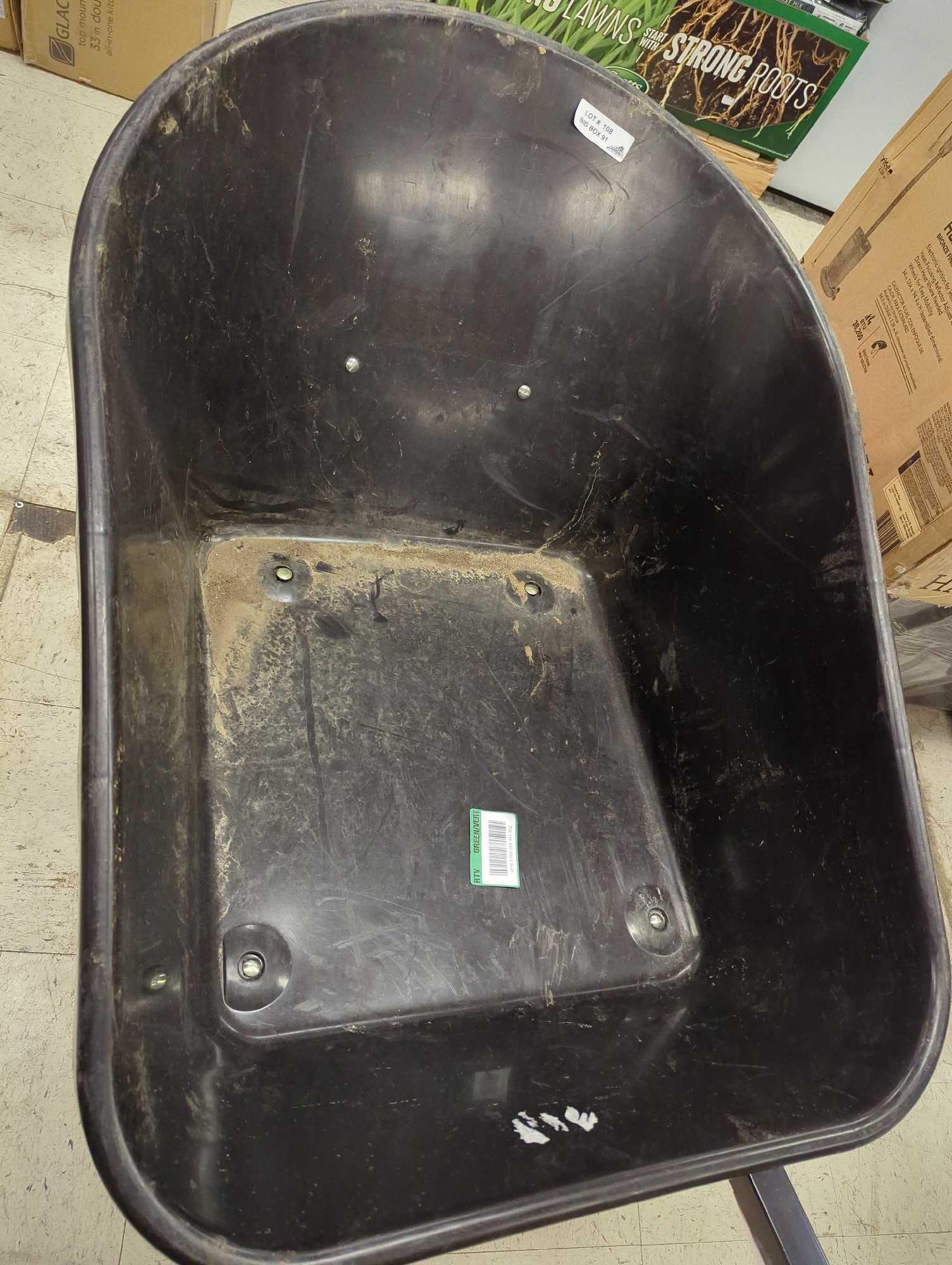 Husky Husky 6 cu. ft. Poly Wheelbarrow with Flat-Free Tires. Thumbs as is shown in photos. Appears