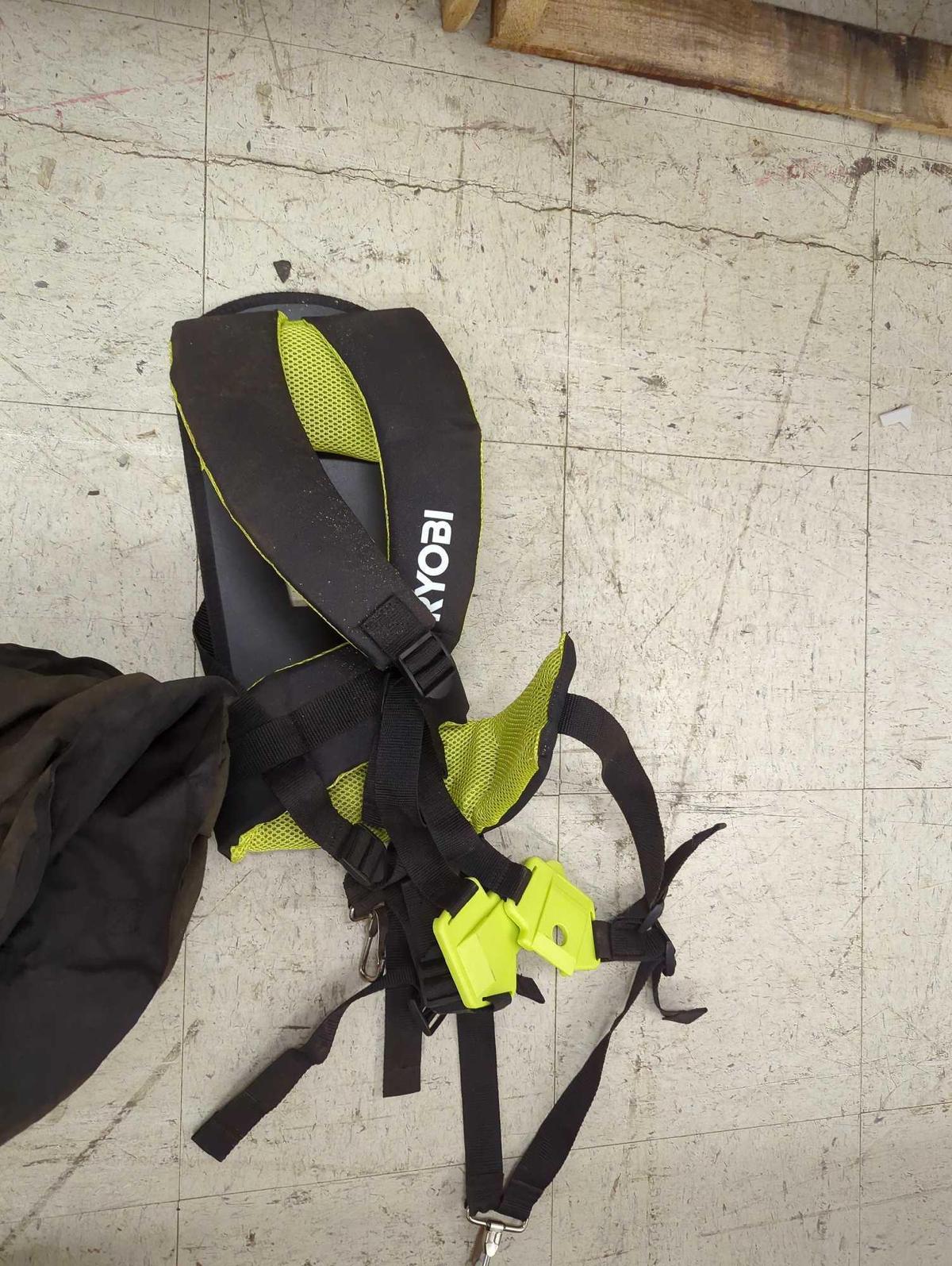 Lot of Items to Include, A Ryobi Backpack Leaf Blower Strap, and Ryobi Leaf bag / maulcher with two