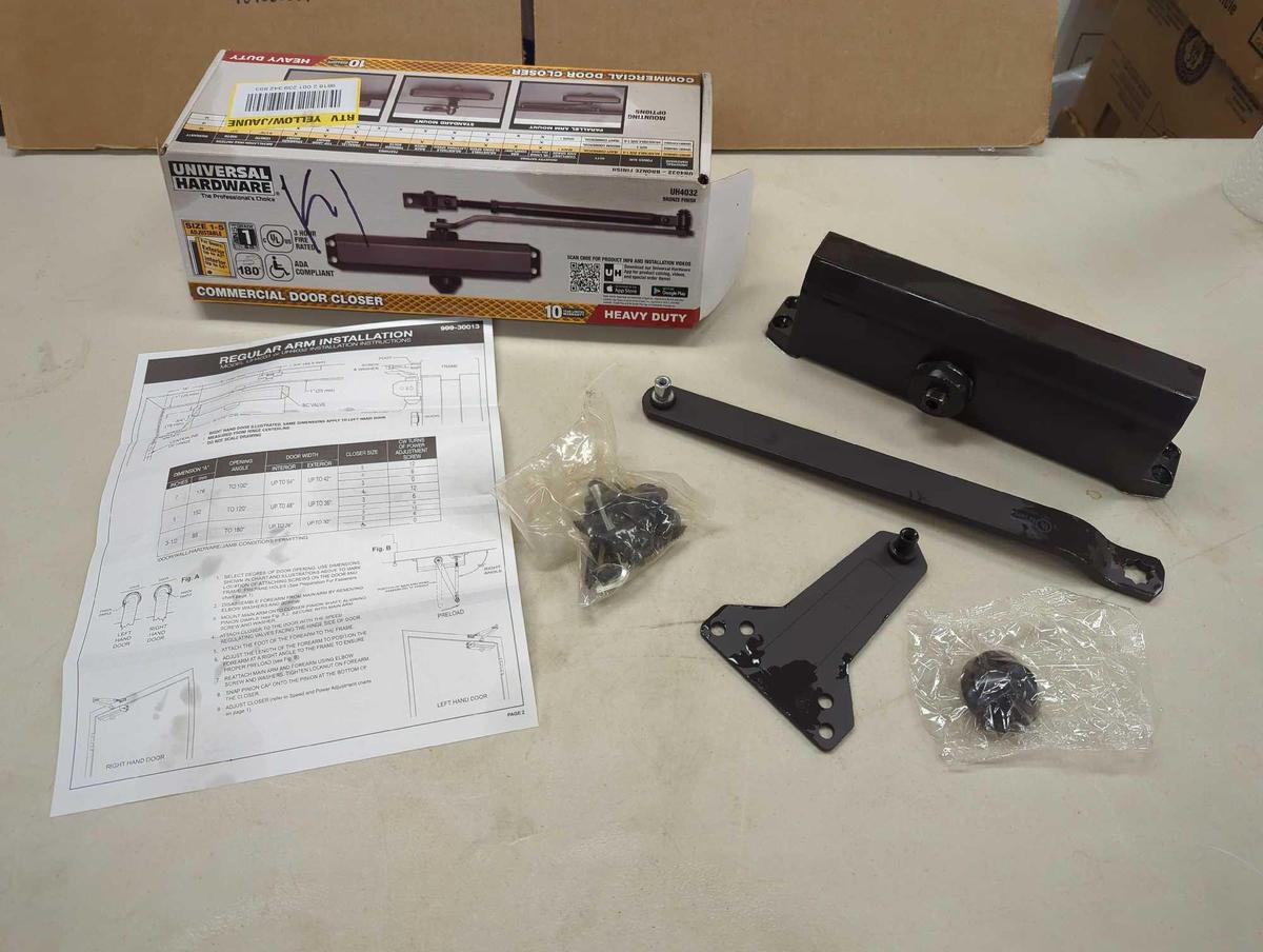 Universal Hardware Heavy-Duty Bronze Commercial Door Closer. Comes in open box as is shown in