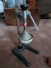 (LR) VINTAGE JUICE PRESS. MEASURES 14-3/4"T. MARKED #317 ON THE BOTTOM.