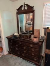 (BR3) KINKAID DARK STAINED ELEVEN DRAWER DRESSER & MIRROR. CHIPPENDALE STYLE PULLS. MEASURES 61"W X