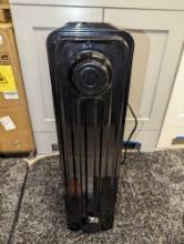 Pelonis 1,500-Watt Oil-Filled Radiant Electric Space Heater with Thermostat, Retail Price $55,