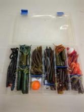 Tackle Box and contents including various fishing worms of similar style. Comes as is shown in