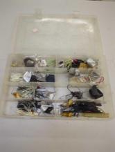 Tackle Box and contents including various fishing lures of similar style. Comes as is shown in