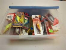 Blue Sterilite organizer tote and contents including various fishing lures of similar style. Comes