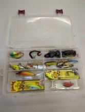 Tackle box and contents including various fishing. Lures. Comes as is shown in photos. Appears to be