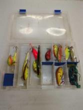 Tackle Box and contents including worms and various fishing lures of similar style. Comes as is