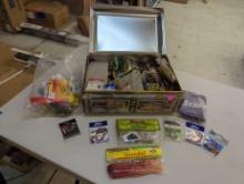 Large tin and contents including various fishing lures and fishing accessories. Comes as is shown in