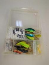 Tackle Box and contents including various fishing lures and other fishing accessories. Comes as is