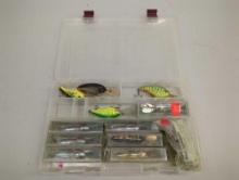 Tackle Box and contents including various fishing lures of similar style. Comes as is shown in