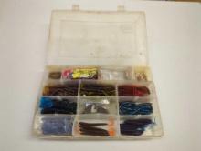 Tackle Box and contents including various fishing lures and other fishing accessories. Comes as is