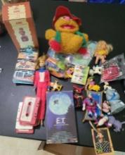 Miscellaneous Toys and Cassettes and ET Tape. $1 STS