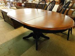 Oval Pedestal Table with Flip Out Leaf