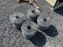 Unused (4) Rolls of Barbed Wire